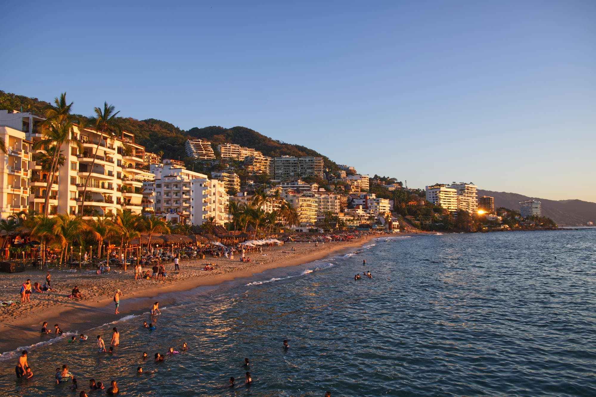The vibrant Puerto Vallarta coastline glowing at sunset